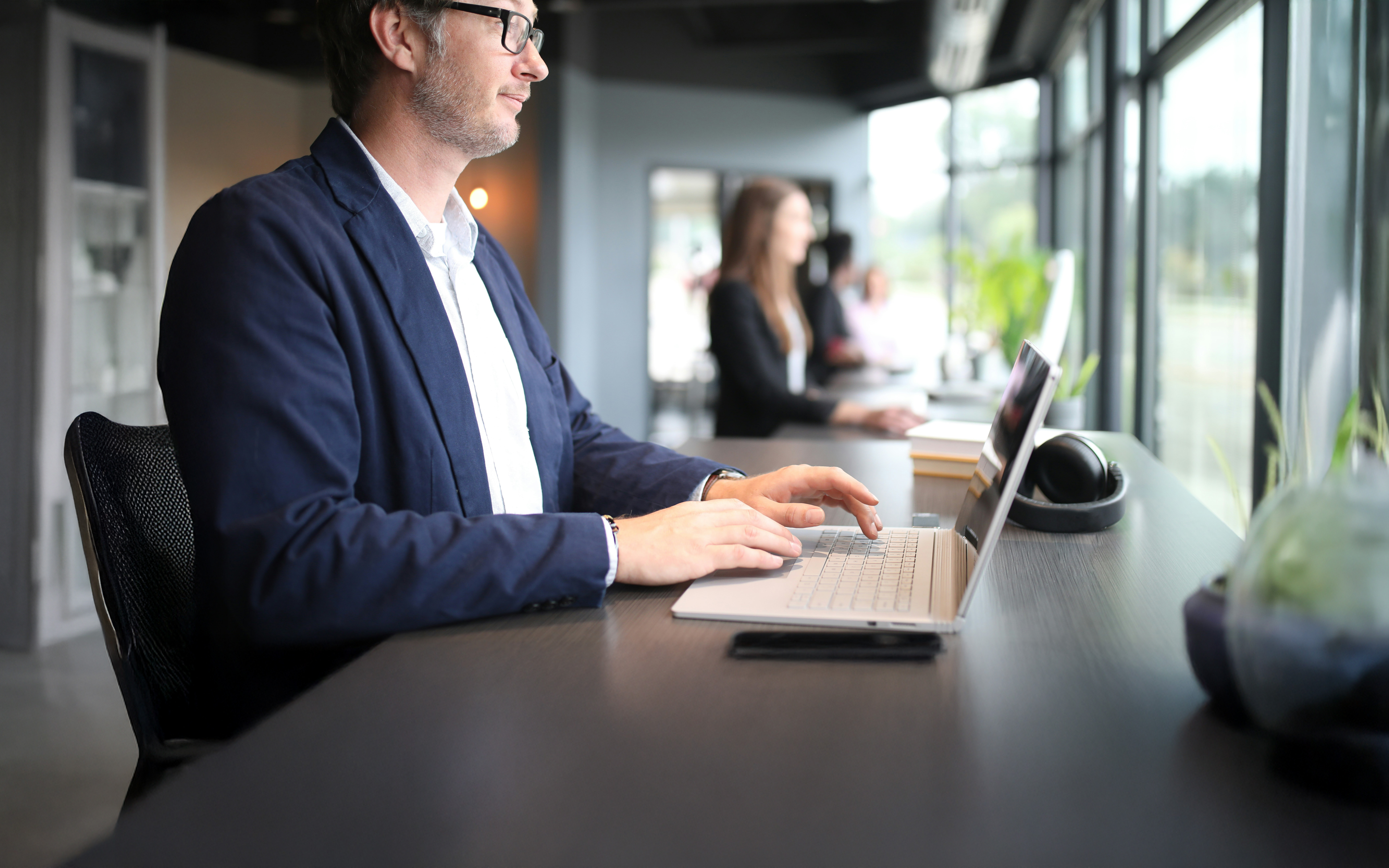 Man working in front on a laptop